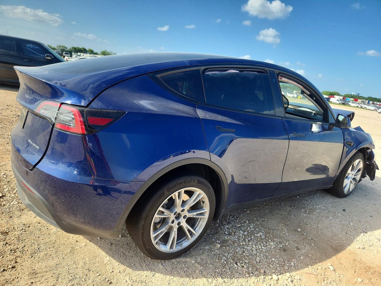 2023 Tesla Model Y VIN 7SAYGDEE6PA107897 COPART salvage auction — Front End, TX - SALVAGE VEHICLE TITLE, sold $9,000 on 2026-07-09 (photo 3)