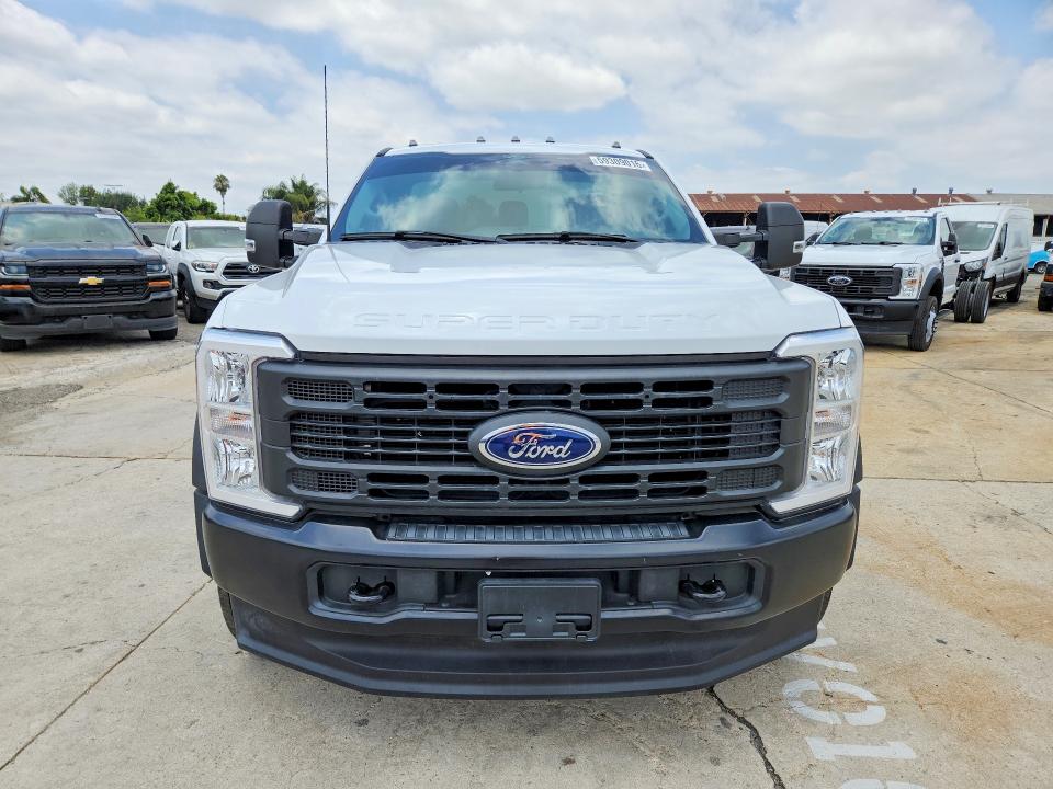 2024 Ford F550 VIN 1FDUF5GT9RDA09424 COPART salvage auction — MINOR DENT/SCRATCHES, Mi - Dis/Dlr/Exp Only Salvage Title, sold $26,750 on 2026-07-08 (photo 5)