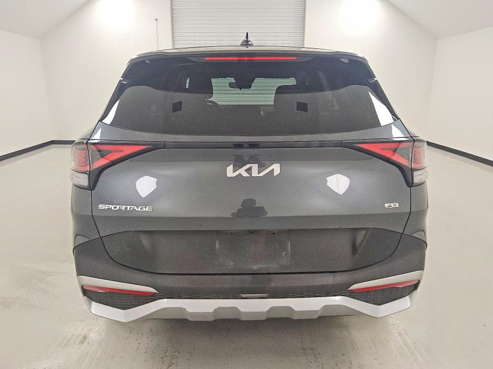 2023 Kia Sportage VIN KNDPUCAF4P7106184 COPART salvage auction — MINOR DENT/SCRATCHES, TX - CERTIFICATE OF TITLE (P), sold $9,900 on 2026-07-23 (photo 6)