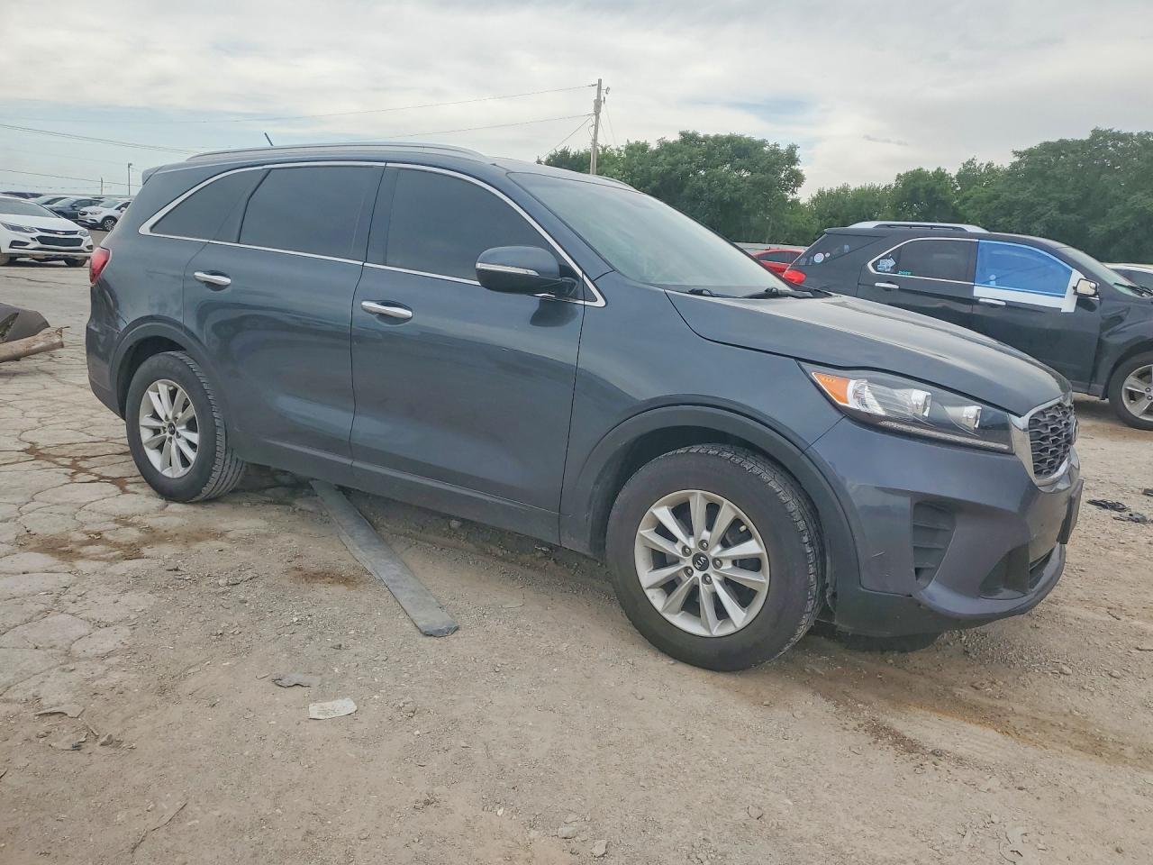 2020 Kia Sorento VIN 5XYPG4A32LG688317 COPART salvage auction — Hail, OK - CERTIFICATE OF TITLE, sold $4,450 on 2026-07-07 (photo 4)