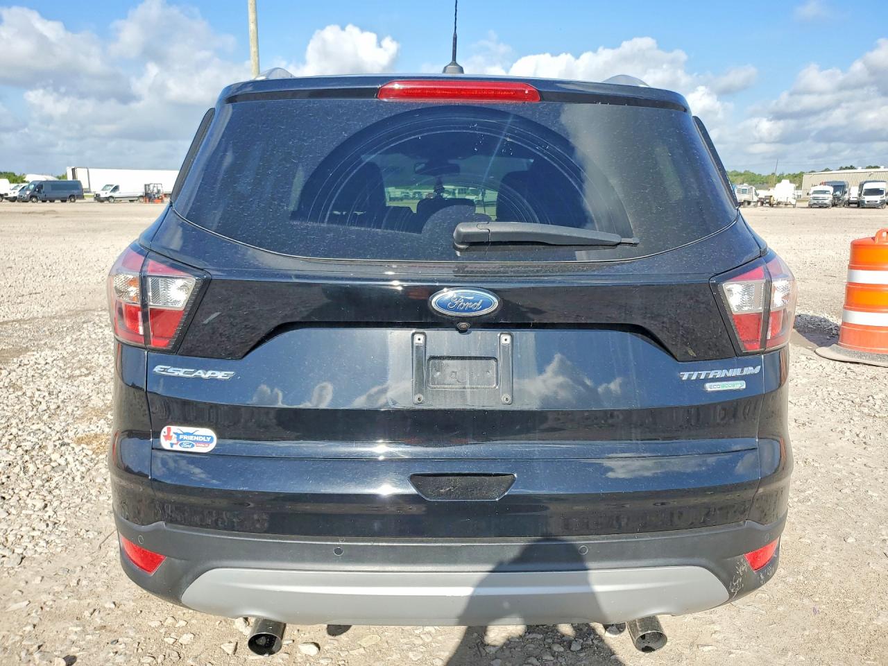 2017 Ford Escape VIN 1FMCU0J98HUD84298 COPART salvage auction — Side, TX - SALVAGE VEHICLE TITLE, sold $2,300 on 2026-07-02 (photo 6)