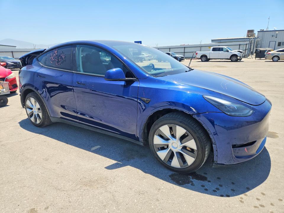 2023 Tesla Model y VIN 7SAYGAEE0PF836964 COPART salvage auction — REAR END, CA - SALVAGE CERTIFICATE, sold $9,800 on 2026-07-24 (photo 4)