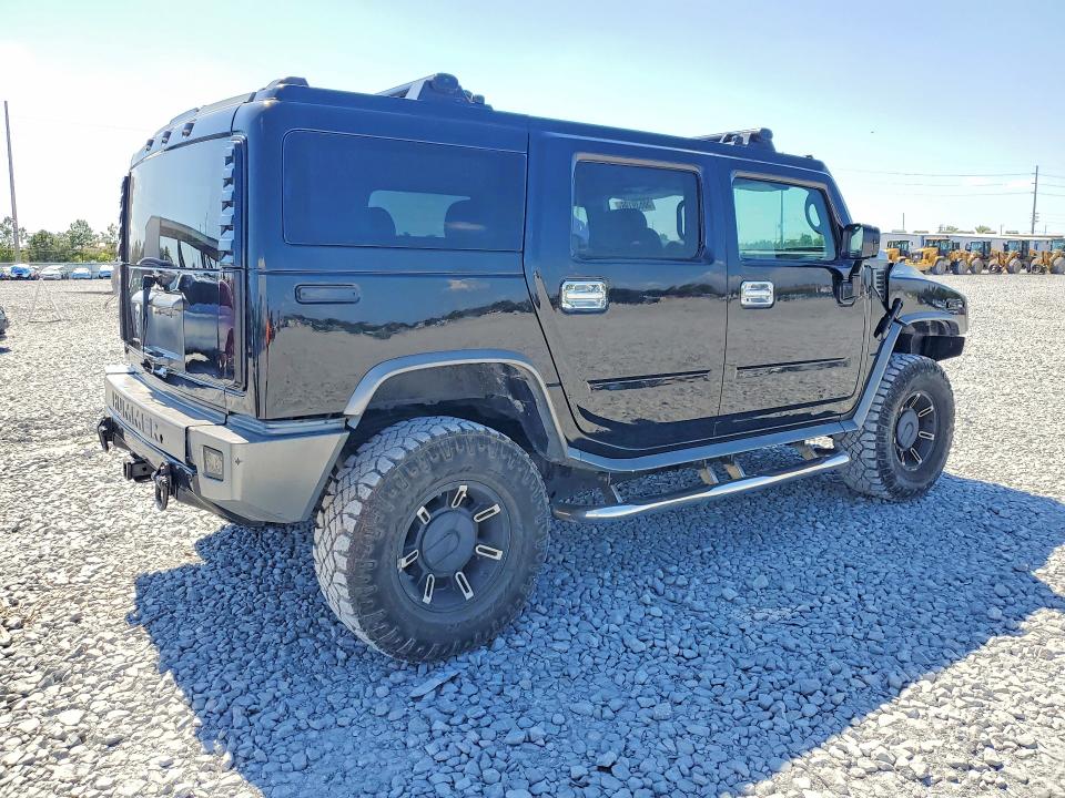 2003 Hummer H2 VIN 5GRGN23U03H120685 COPART salvage auction — MINOR DENT/SCRATCHES, Fl - Cert Of Title-Rebuilt, sold $1,650 on 2026-07-31 (photo 3)