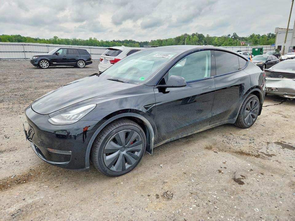 2023 Tesla Model y VIN 7SAYGDEE0PA022991 COPART salvage auction — FRONT END, Va - Cert Of Title - Salvage, sold $10,400 on 2026-07-15 (photo 1)