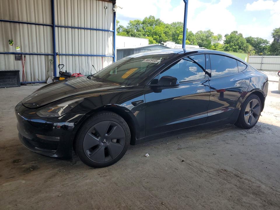 2021 Tesla Model 3 VIN 5YJ3E1EBXMF051026 COPART salvage auction — REAR END, GA - CERT OF TITLE-SALVAGE (P), sold $9,400 on 2026-07-16 (photo 1)