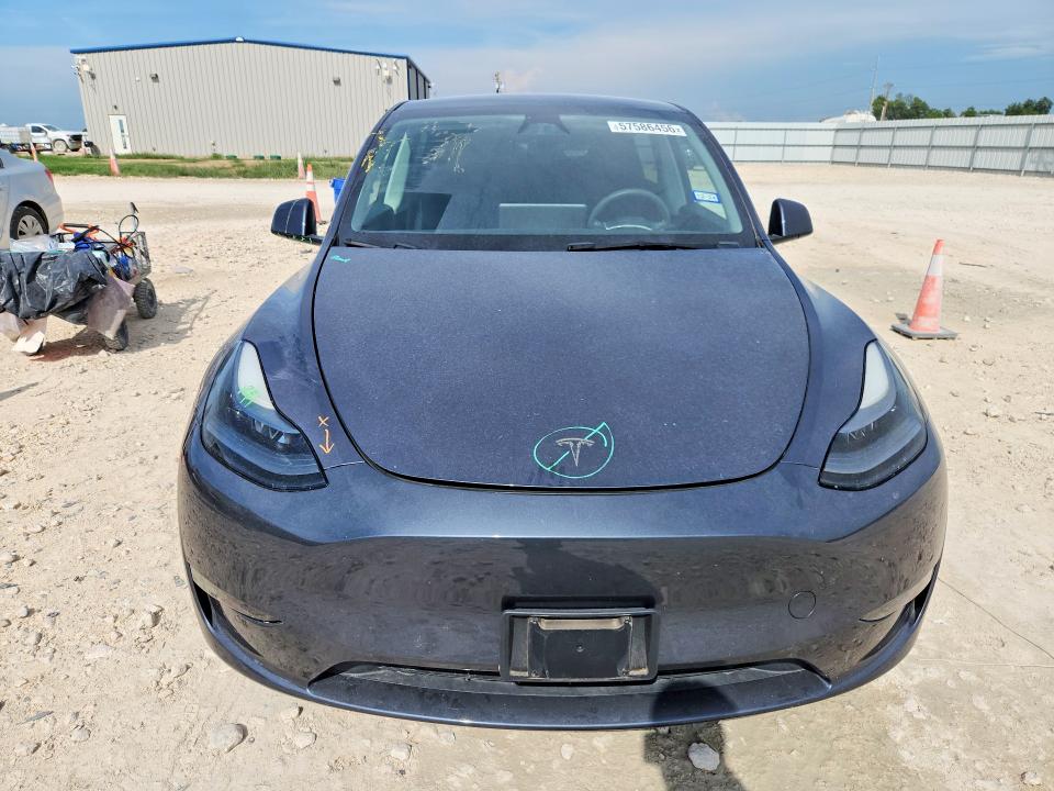 2023 Tesla VIN 7SAYGDED5PF958132 COPART salvage auction — SIDE, Tx - Salvage Vehicle Title, sold $2,000 on 2026-07-30 (photo 5)
