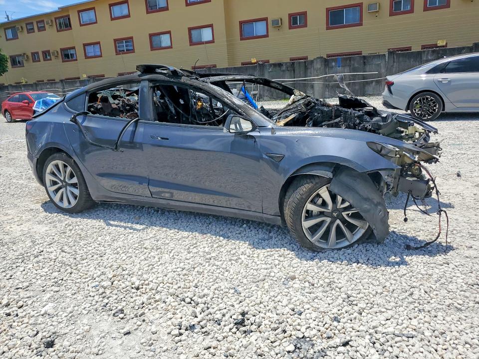 2019 Tesla Model 3 VIN 5YJ3E1EB2KF418529 COPART salvage auction — BURN, Fl - Certificate Of Destruction, sold $300 on 2026-07-31 (photo 4)