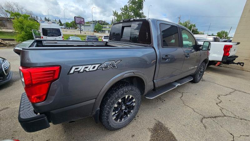 2018 Nissan TITAN VIN 1N6AA1E53JN524384 COPART salvage auction — NORMAL WEAR, Ab - Oop - Active, sold $7,900 on 2026-07-15 (photo 4)
