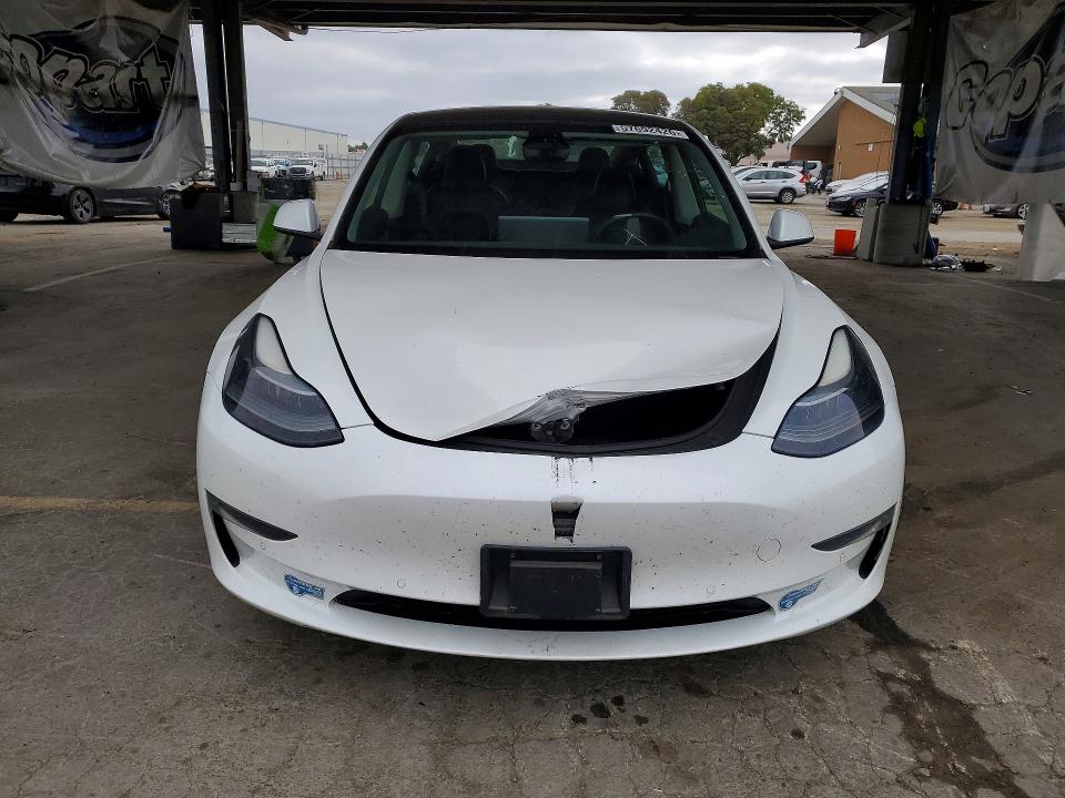 2021 Tesla VIN 5YJ3E1EB7MF902246 COPART salvage auction — REAR END, CA - SALVAGE CERTIFICATE, sold $15 on 2026-07-28 (photo 5)
