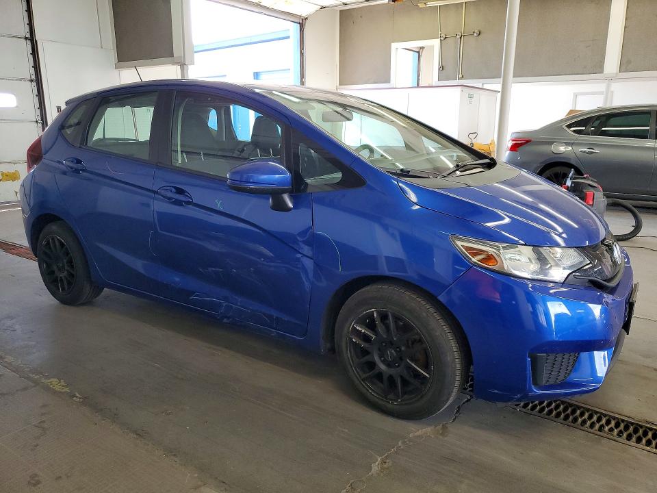 2015 Honda Fit VIN 3HGGK5H5XFM766007 COPART salvage auction — SIDE, WA - BILL OF SALE, sold $3,300 on 2026-07-10 (photo 4)