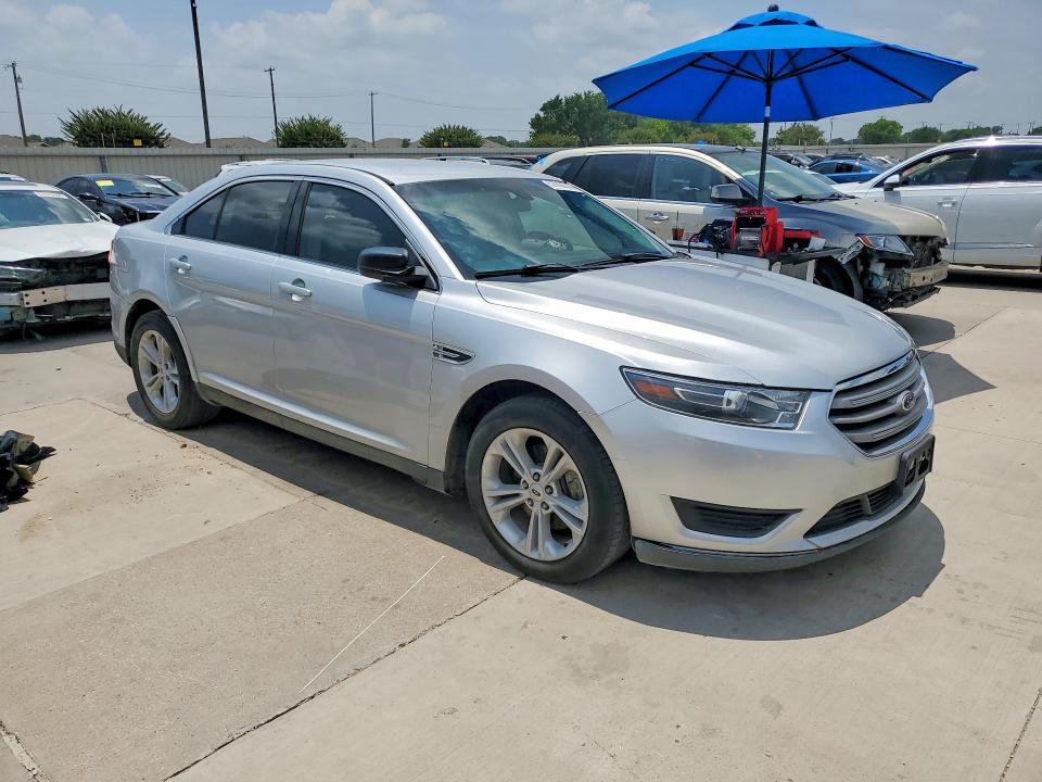 2016 Ford Taurus VIN 1FAHP2D82GG129259 COPART salvage auction — SIDE, Tx - Certificate Of Title (P), sold $2,000 on 2026-07-03 (photo 4)