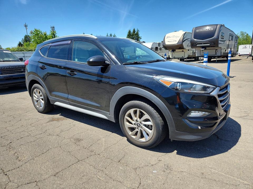 2018 Hyundai Tucson VIN KM8J3CA42JU607697 COPART salvage auction — MECHANICAL, Or - Cert Of Title-Reconstructed, sold $2,950 on 2026-07-20 (photo 4)