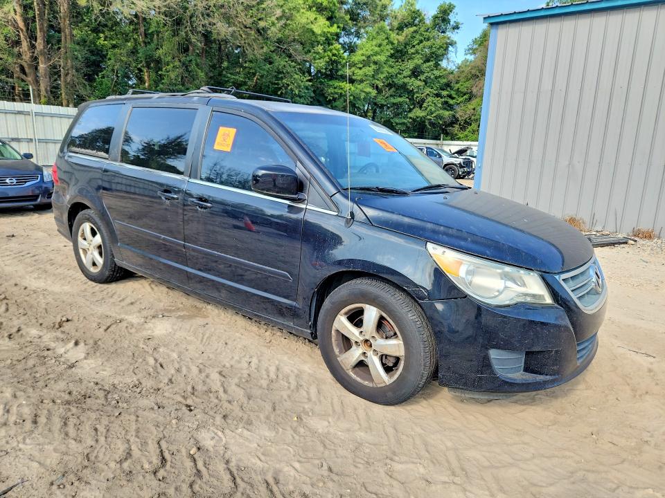 2011 Volkswagen Routan VIN 2V4RW3DG8BR717680 COPART salvage auction — MINOR DENT/SCRATCHES, Fl - Certificate Of Title, sold $125 on 2026-07-31 (photo 4)