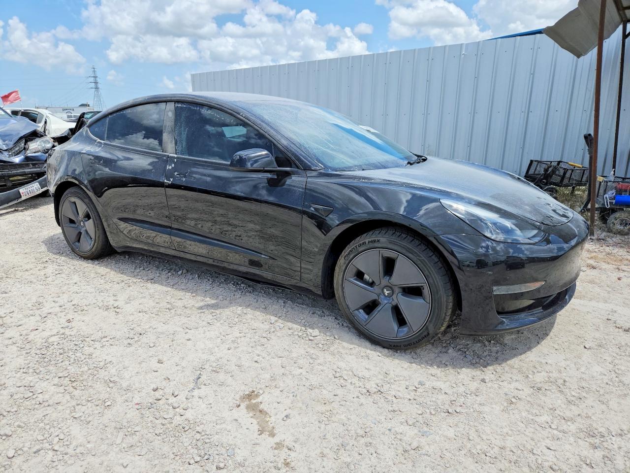 2023 Tesla Model 3 VIN 5YJ3E1EA4PF460120 COPART salvage auction — Rear End, AZ - CERT OF TITLE - SALVAGE, sold $8,400 on 2026-07-02 (photo 4)