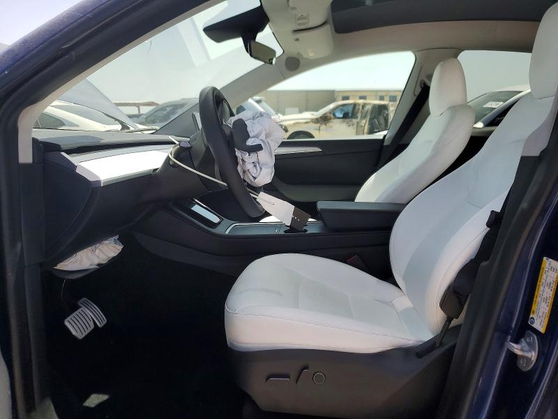 2023 Tesla Model y VIN 7SAYGDEF2PF749870 COPART salvage auction — FRONT END, TX - SALVAGE VEHICLE TITLE, sold $9,500 on 2026-07-20 (photo 7)