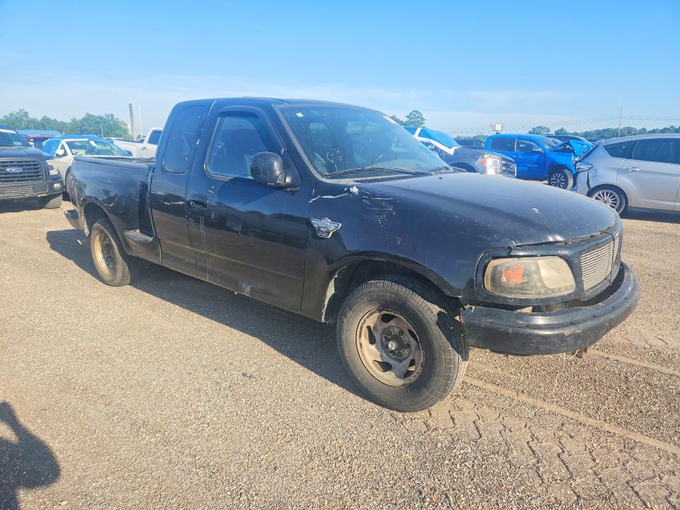 2003 Ford F-150 lightning VIN 1FTRX07253KC11407 COPART salvage auction — MECHANICAL, Fl - Cert Of Title Slvg Rebuildable, sold $1,747 on 2026-07-09 (photo 4)