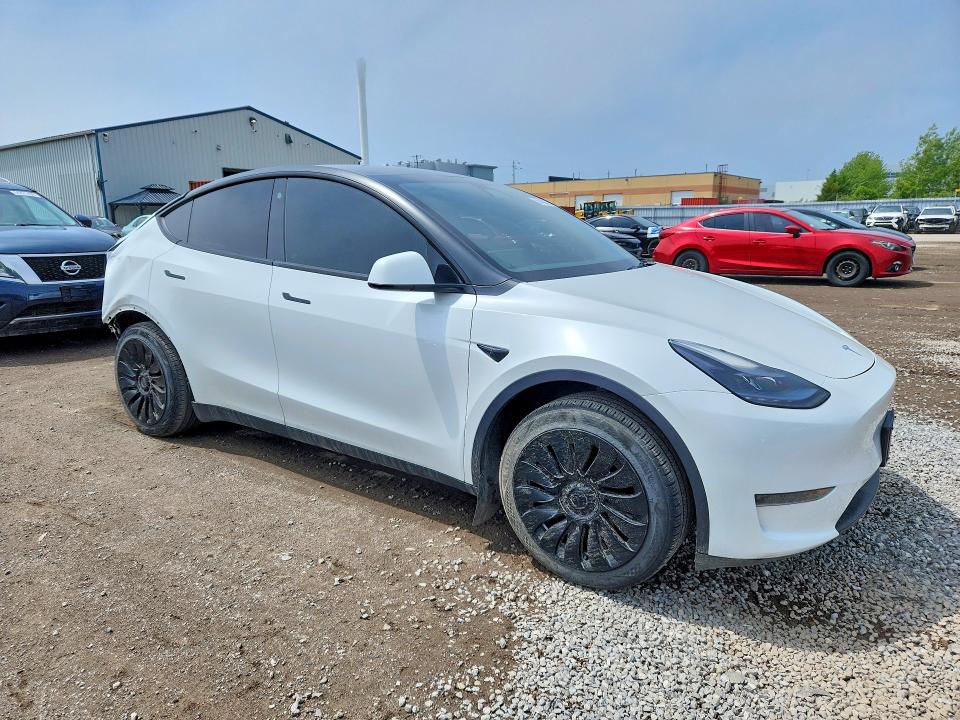 2023 Tesla Model y VIN LRWYGDFDXPC901706 COPART salvage auction — REAR END, On - Permit Salvage, sold $6,600 on 2026-07-28 (photo 4)