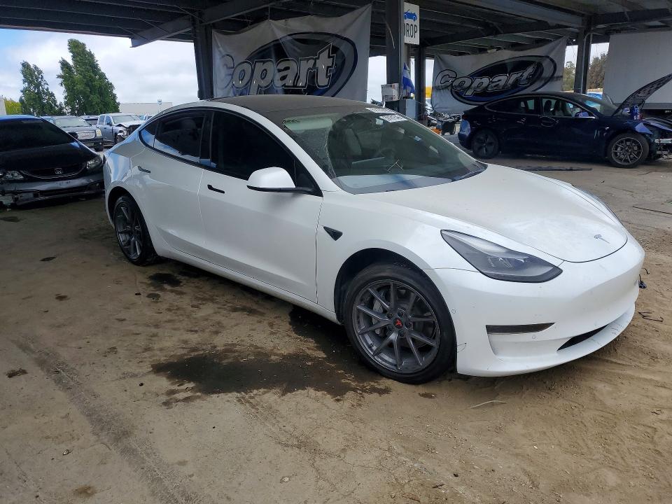 2022 Tesla Model 3 VIN 5YJ3E1EA3NF112256 COPART salvage auction — ROOF, Ca - Salvage Certificate, sold $6,700 on 2026-07-28 (photo 4)