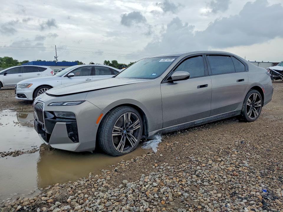 2024 BMW VIN WBA33EJ00RCR45958 COPART salvage auction — SIDE, TX - SALVAGE VEHICLE TITLE (P), sold $37,250 on 2026-07-16 (photo 1)