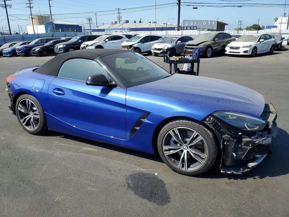 2023 BMW Z4 VIN WBAHF3C03PWY27056 COPART salvage auction — FRONT END, Ca - Salvage Certificate, sold $11,000 on 2026-07-13 (photo 4)