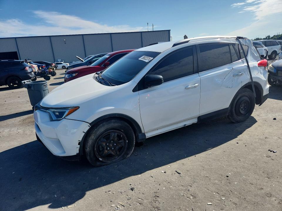 2016 Toyota Rav 4 VIN JTMZFREV6GJ094856 COPART salvage auction — ROLLOVER, Fl - Certificate Of Title, sold $2,450 on 2026-07-27 (photo 1)