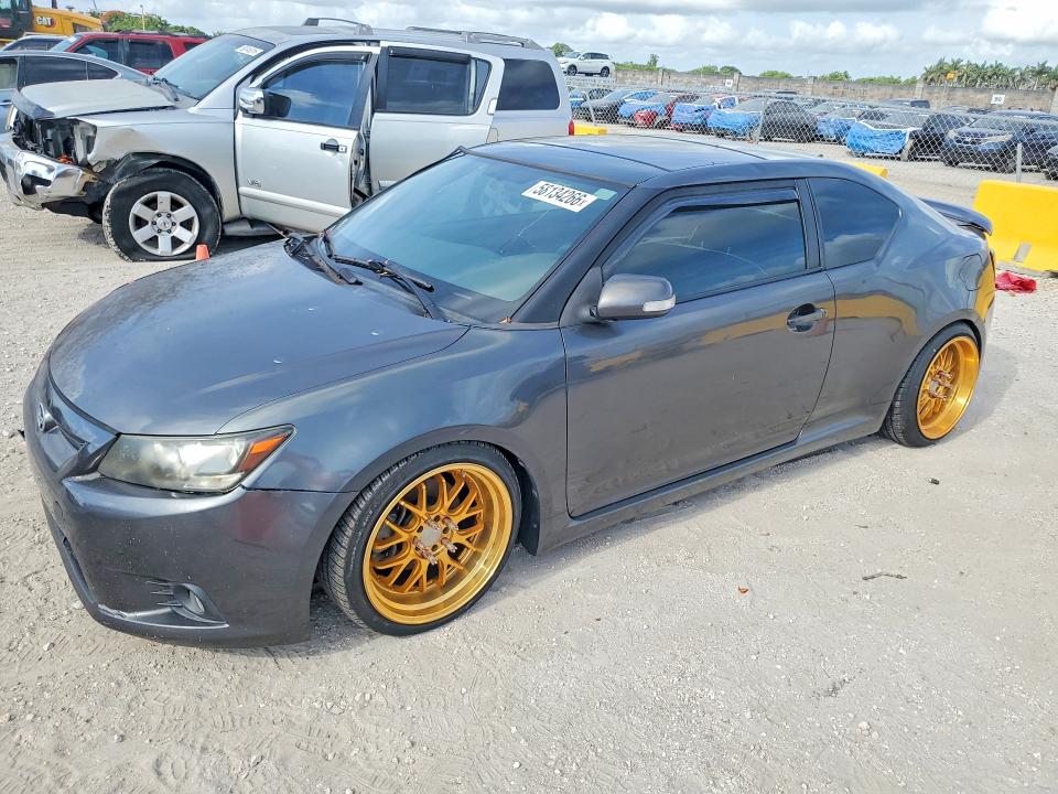 2012 Scion VIN JTKJF5C7XC3041420 COPART salvage auction — MINOR DENT/SCRATCHES, Fl - Cert Of Title-Rebuilt, sold $375 on 2026-07-29 (photo 1)