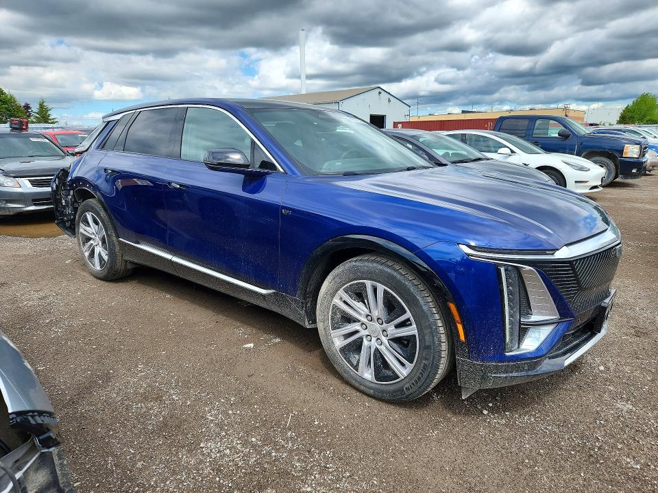 2024 Cadillac Lyriq VIN 1GYKPMRK7RZ107744 COPART salvage auction — REAR END, ON - PERMIT SALVAGE, sold $16,950 on 2026-08-18 (photo 4)