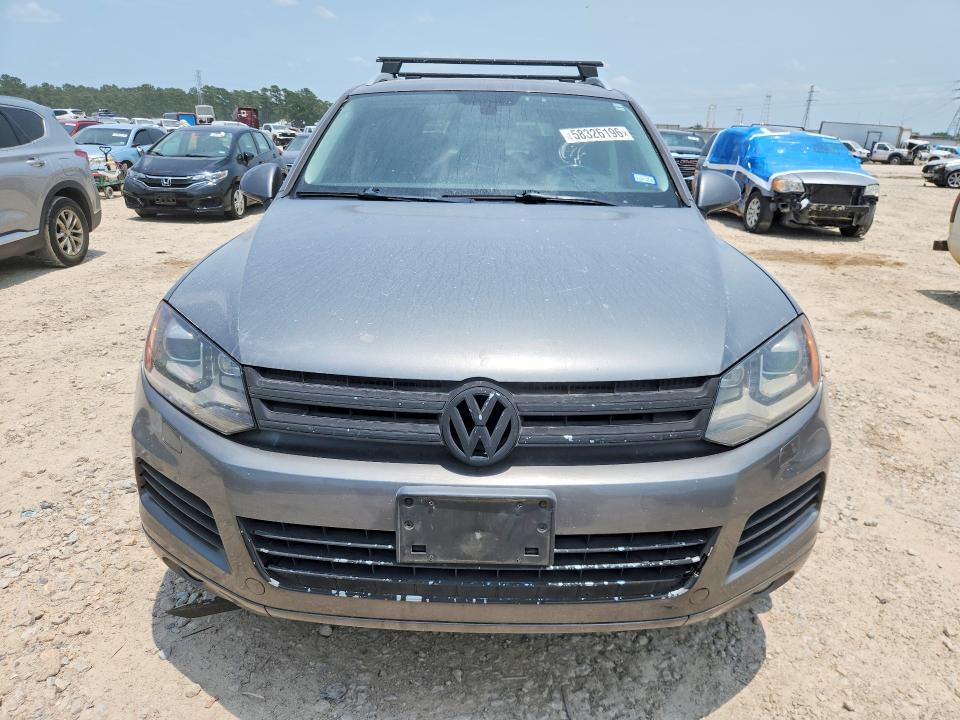 2011 Volkswagen Touareg VIN WVGFF9BP3BD001237 COPART salvage auction — MINOR DENT/SCRATCHES, Tx - Certificate Of Title, sold $750 on 2026-07-21 (photo 5)