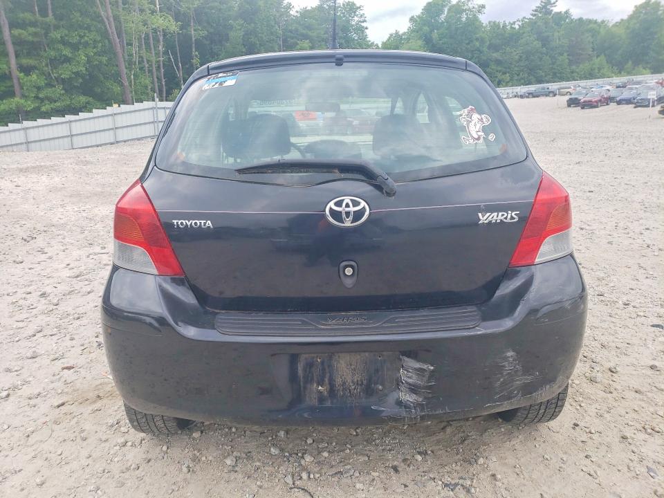 2009 Toyota Yaris VIN JTDKT903795230729 COPART salvage auction — REAR END, MA - CERT OF TITLE-RECONSTRCTD COLL, sold $375 on 2026-07-22 (photo 6)