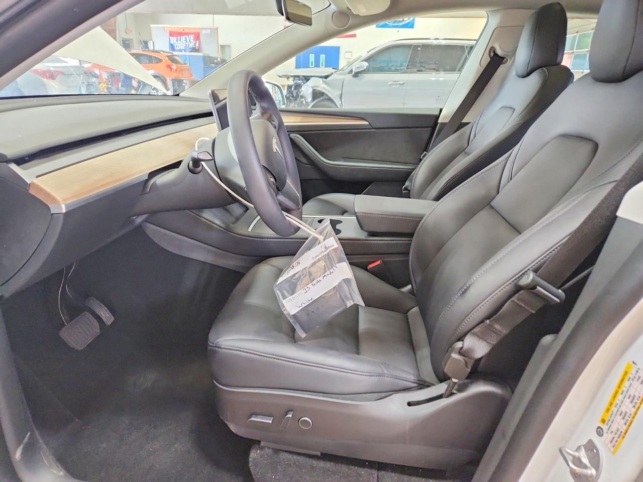 2023 Tesla Model Y VIN 7SAYGDEE7PF606971 COPART salvage auction — Rear End, NY - MV-907A SALVAGE CERTIFICATE, sold $8,900 on 2026-07-06 (photo 7)
