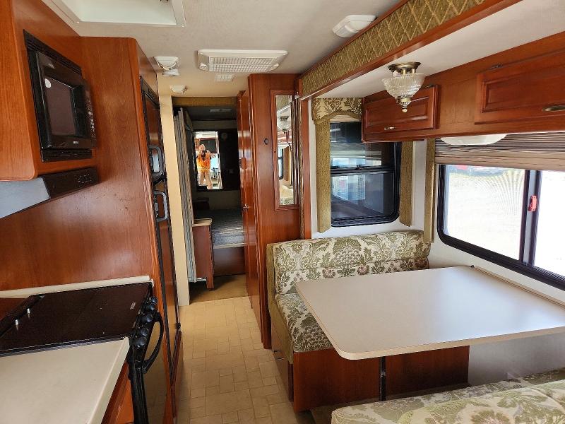 2004 Workhorse Motorhome chassis VIN 5B4MP67G143391429 COPART salvage auction — SIDE, Ak - Certificate Of Vehicle Title, sold $9,000 on 2026-07-07 (photo 6)