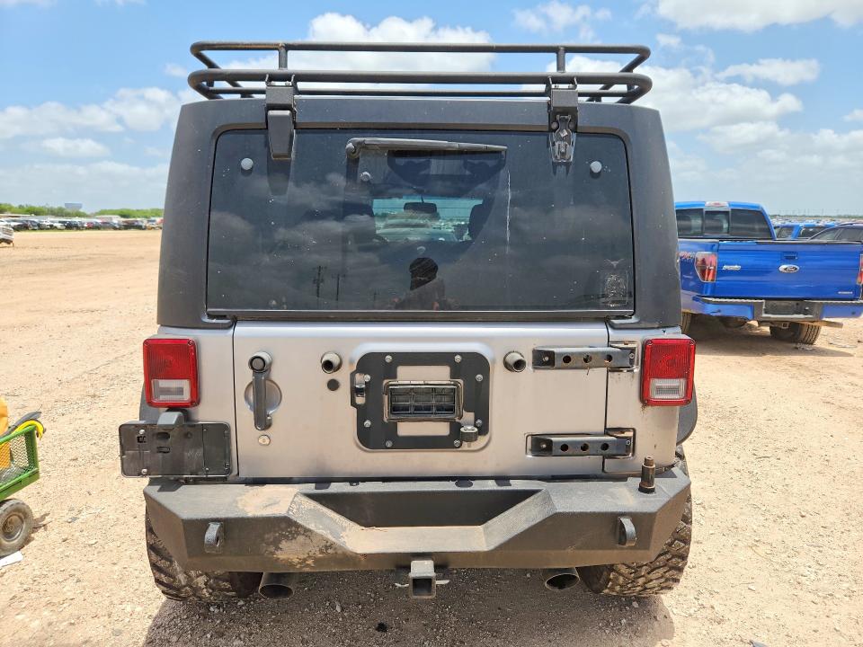2015 Jeep Wrangler / VIN 1C4BJWDG5FL751277 COPART salvage auction — MECHANICAL, Tx - Certificate Of Title, sold $3,850 on 2026-07-09 (photo 6)