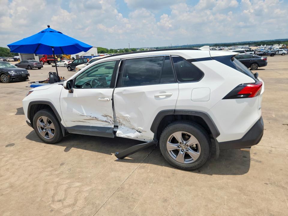 2023 Toyota Rav 4 VIN 4T3RWRFV7PU105007 COPART salvage auction — SIDE, Tx - Salvage Vehicle Title, sold $15,900 on 2026-07-09 (photo 2)