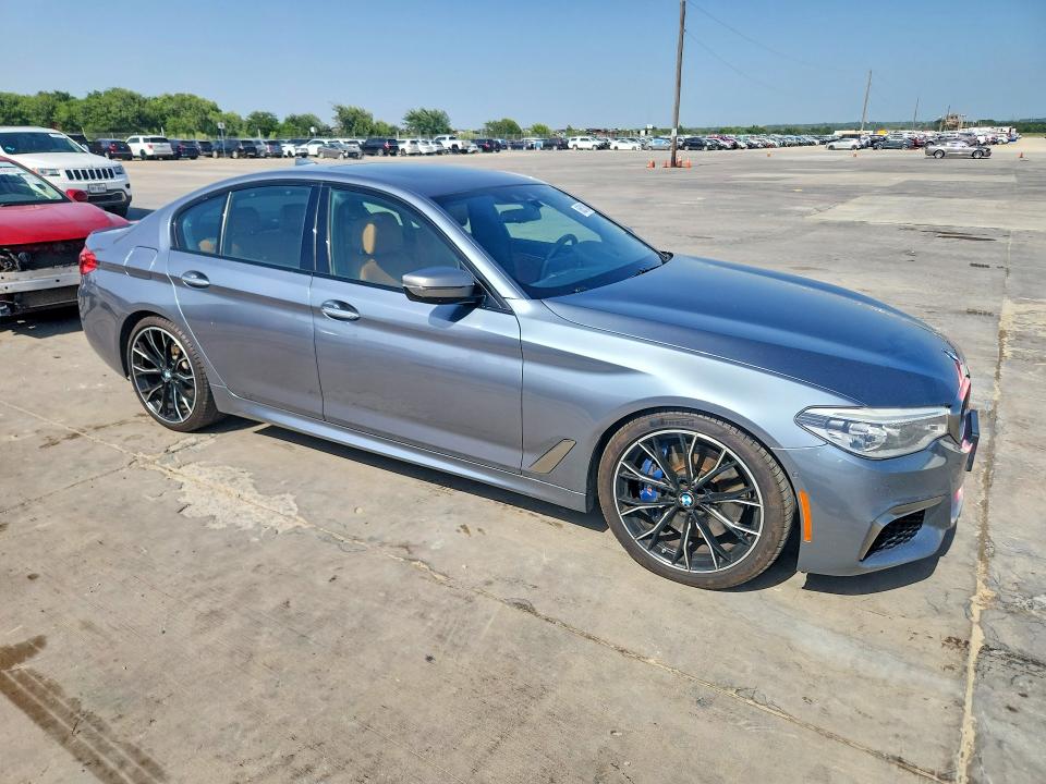 2018 BMW M5 VIN WBAJB9C5XJB035786 COPART salvage auction — NORMAL WEAR, Tx - Certificate Of Title, sold $12,800 on 2026-07-27 (photo 4)