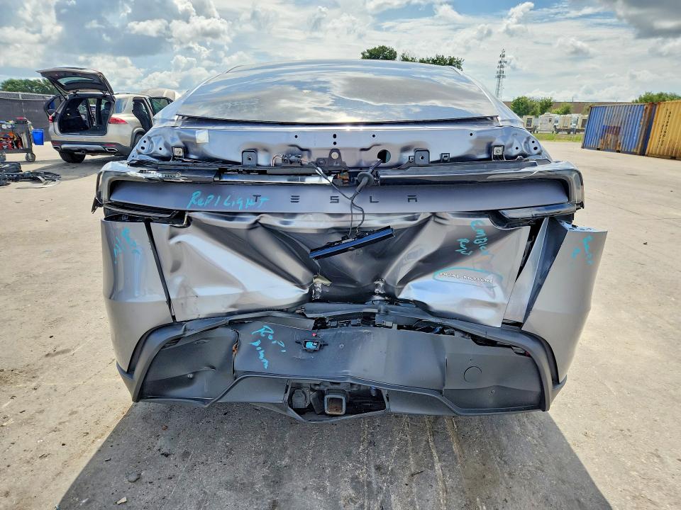 2026 Tesla Model y VIN 7SAYGDEE1TA401122 COPART salvage auction — REAR END, Fl - Cert Of Title Slvg Rebuildable, sold $13,100 on 2026-07-30 (photo 6)