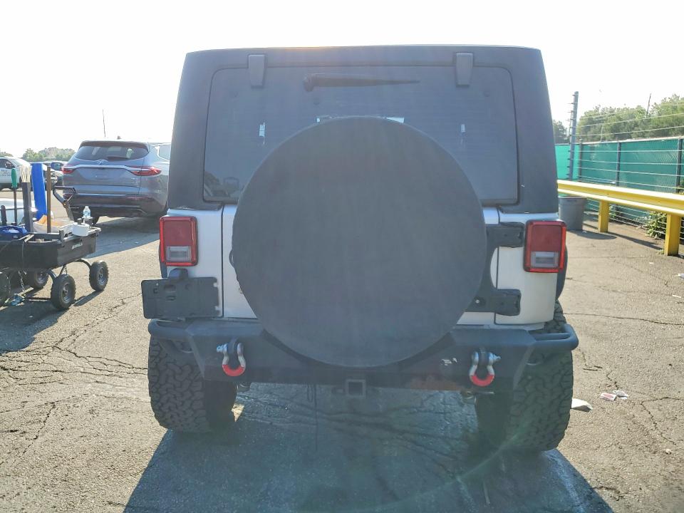 2011 Jeep Wrangler / VIN 1J4AA2D1XBL548163 COPART salvage auction — FRONT END, Co - Certificate Of Title, sold $3,500 on 2026-07-02 (photo 6)