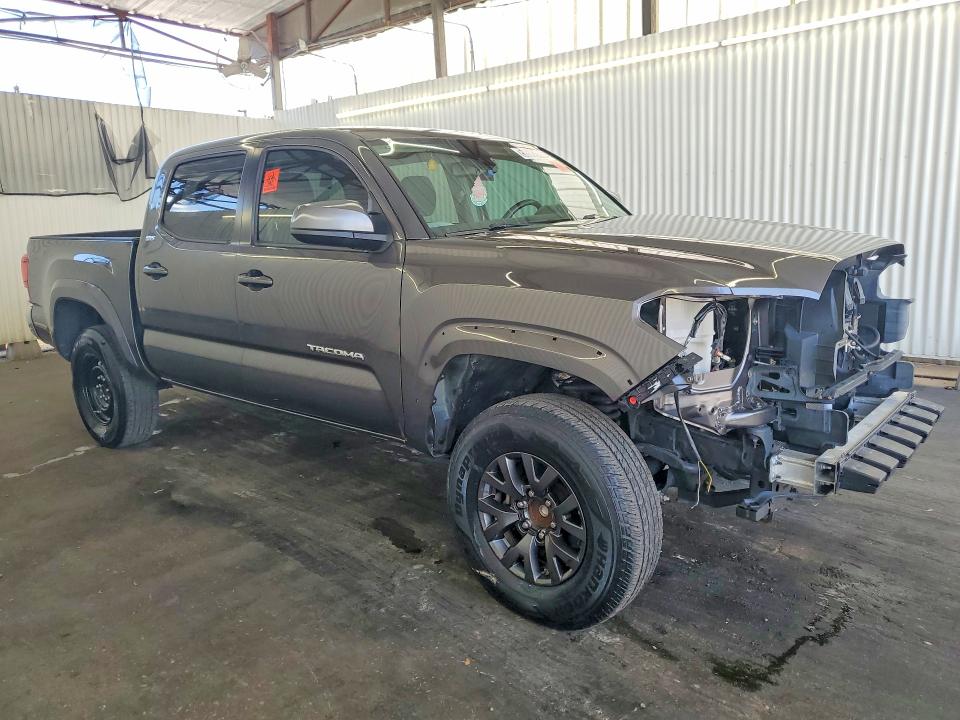 2020 Toyota Tacoma VIN 3TMAZ5CN8LM126963 COPART salvage auction — FRONT END, Fl - Certificate Of Title, sold $16,700 on 2026-07-09 (photo 4)