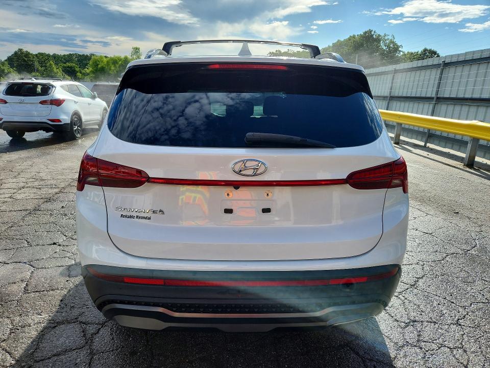 2022 Hyundai Santa fe VIN 5NMS64AJ7NH387806 COPART salvage auction — HAIL, Mo - Salvage Certificate Of Title, sold $7,600 on 2026-07-29 (photo 6)