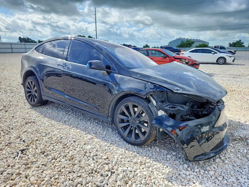 2022 Tesla Model x VIN 7SAXCBE69NF357039 COPART salvage auction — FRONT END, TX - SALVAGE VEHICLE TITLE (P), sold $16,600 on 2026-08-20 (photo 4)