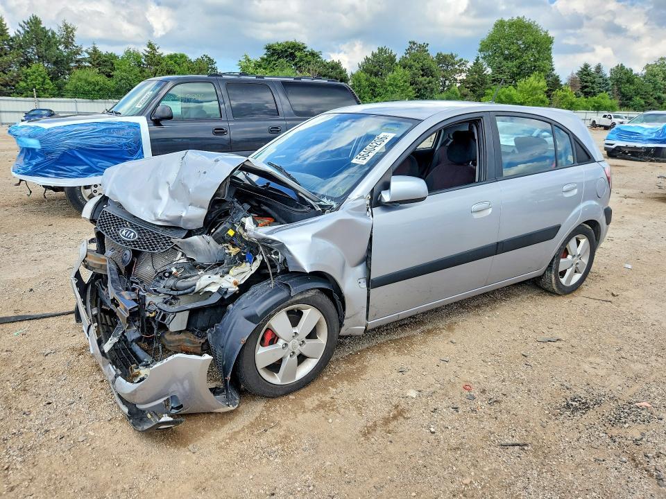 2009 Kia Rio VIN KNADE243196493150 COPART salvage auction — FRONT END, IL - SALVAGE CERTIFICATE, sold $250 on 2026-07-28 (photo 1)