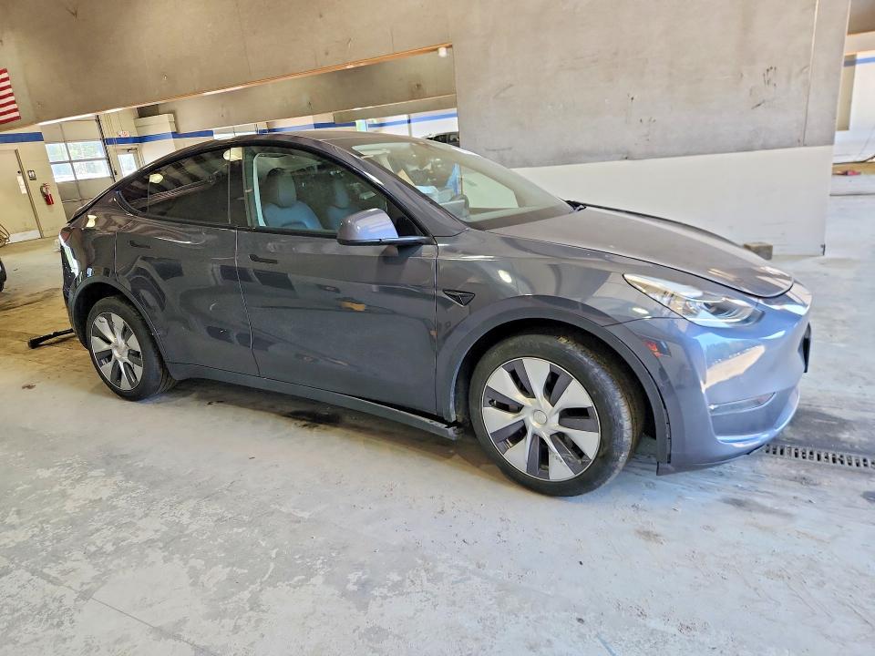 2022 Tesla Model y VIN 7SAYGDEE4NA020013 COPART salvage auction — UNDERCARRIAGE, Va - Cert Of Title - Salvage, sold $11,400 on 2026-07-17 (photo 4)