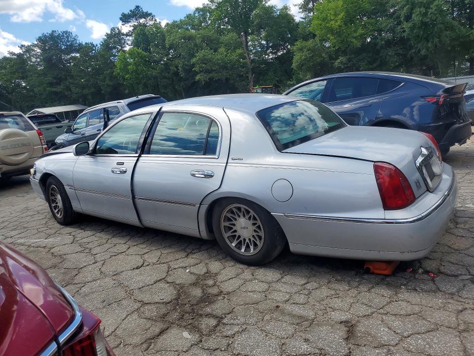 2001 Lincoln TOWN CAR VIN 1LNHM82WX1Y728687 COPART salvage auction — SIDE, GA - CERT OF TITLE-SALVAGE, sold $425 on 2026-07-31 (photo 2)