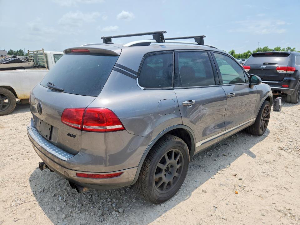 2011 Volkswagen Touareg VIN WVGFF9BP3BD001237 COPART salvage auction — MINOR DENT/SCRATCHES, Tx - Certificate Of Title, sold $750 on 2026-07-21 (photo 3)