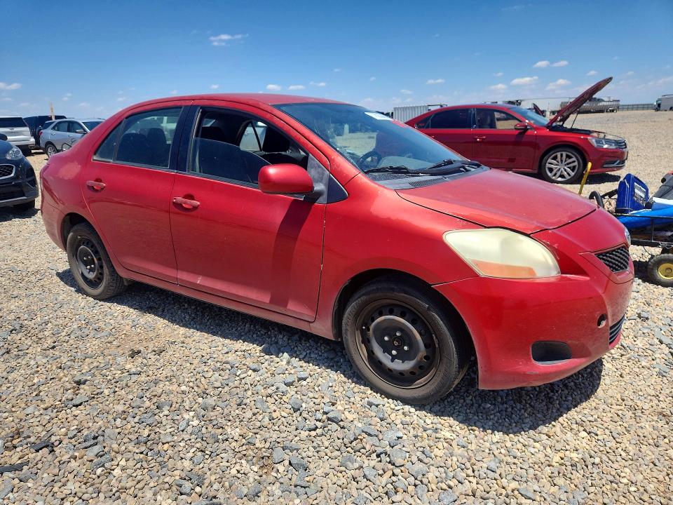 2011 Toyota Yaris VIN JTDBT4K30B1404802 COPART salvage auction — SIDE, Ks - Cert Of Title-Salvage, sold $750 on 2026-07-28 (photo 4)