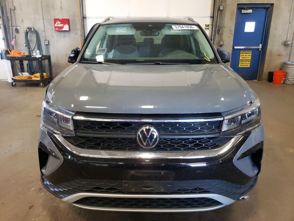 2023 Volkswagen Taos VIN 3VVNX7B27PM320482 COPART salvage auction — SIDE, Mn - Cert Of Title-Salvage, sold $525 on 2026-08-25 (photo 5)