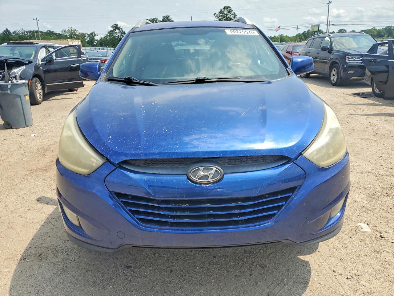 2014 Hyundai Tucson VIN KM8JU3AG2EU799930 COPART salvage auction — Side, AL - CERT OF TITLE-SALVAGE TITLE, sold $1,100 on 2026-07-02 (photo 5)