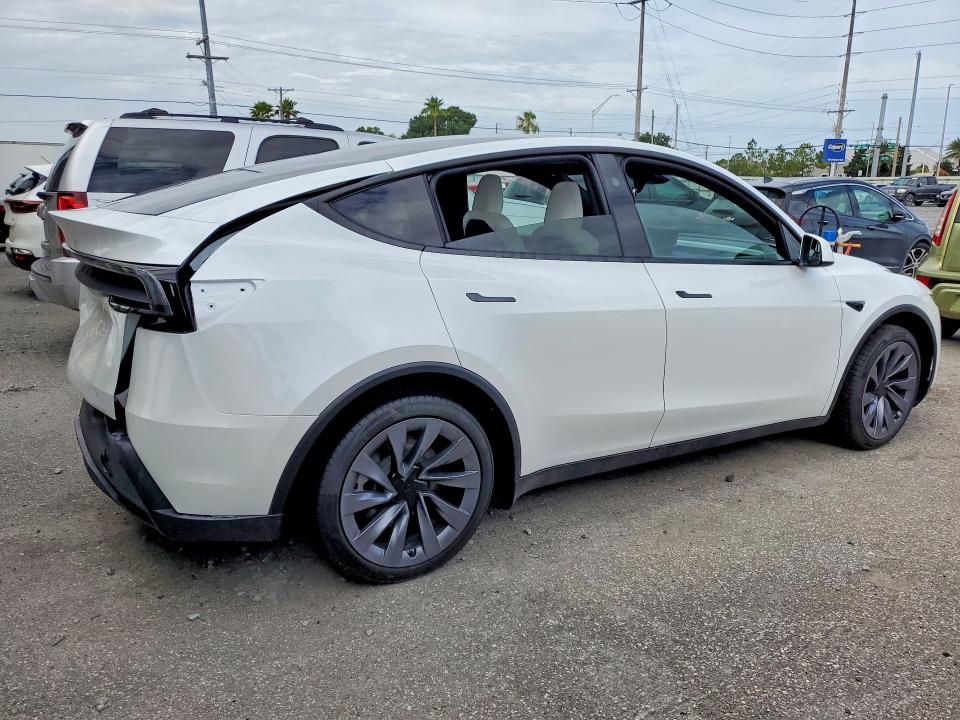 2026 Tesla Model y VIN 7SAYGDED3TA651775 COPART salvage auction — REAR END, FL - CERT OF TITLE SLVG REBUILDABLE, sold $22,700 on 2026-07-31 (photo 3)