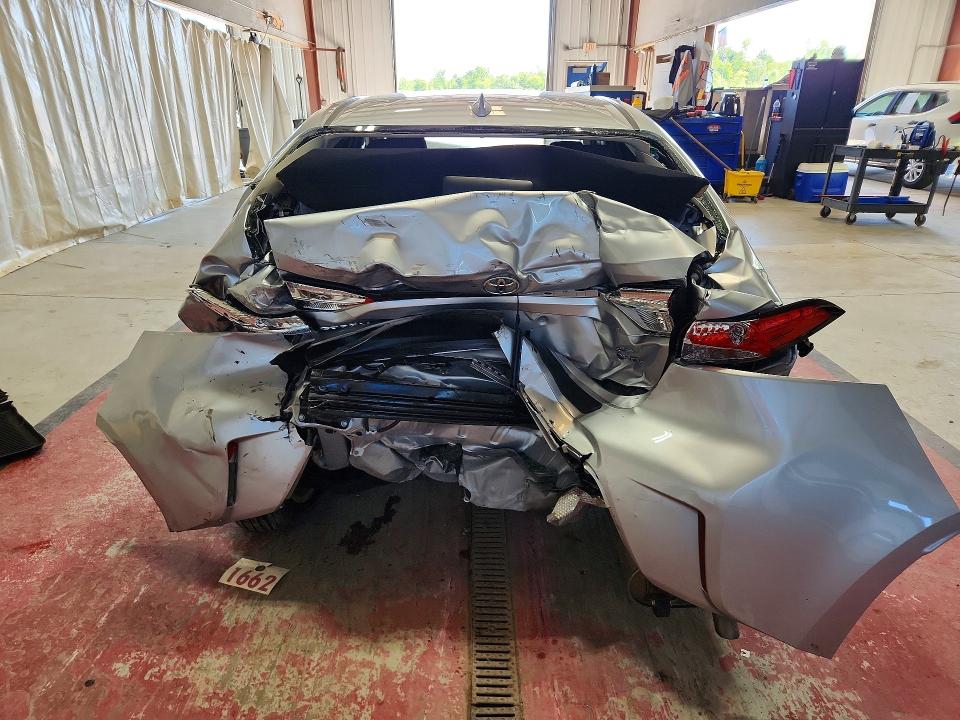 2026 Toyota Corolla VIN JTDBCMFE4T3122891 COPART salvage auction — REAR END, NY - MV-907A SALVAGE CERTIFICATE, sold $1,700 on 2026-07-27 (photo 6)