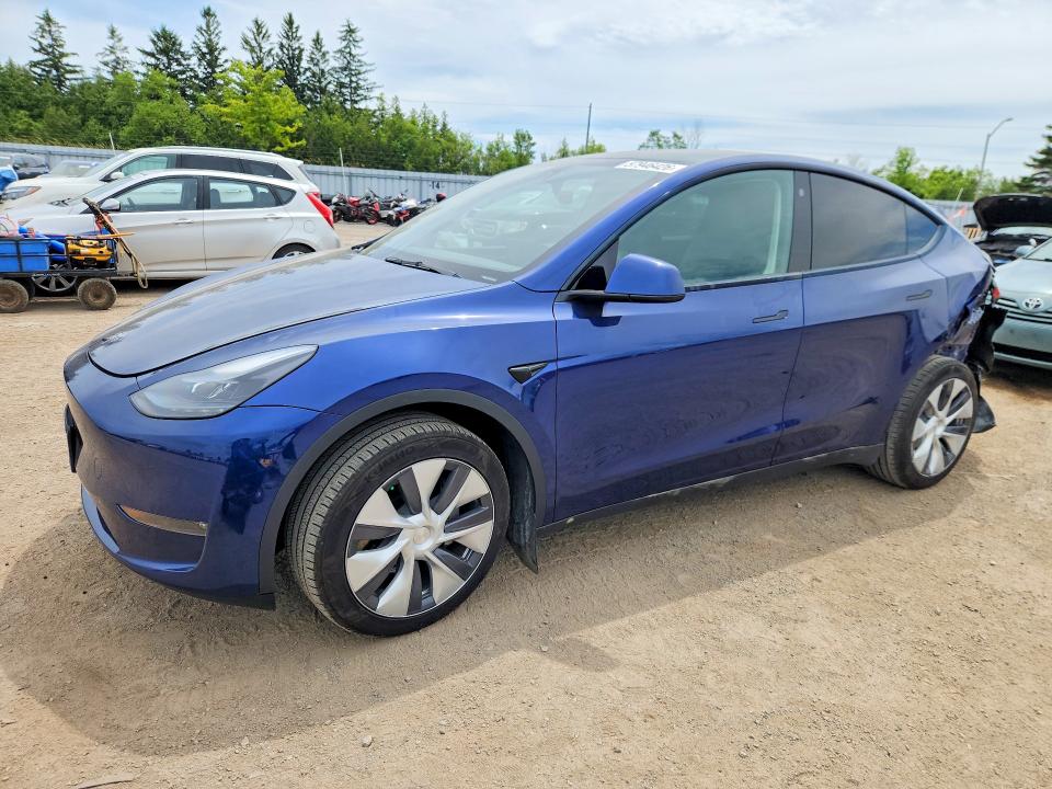 2023 Tesla Model y VIN LRWYGDEE0PC228256 COPART salvage auction — REAR END, ON - PERMIT SALVAGE, sold $10,700 on 2026-07-30 (photo 1)