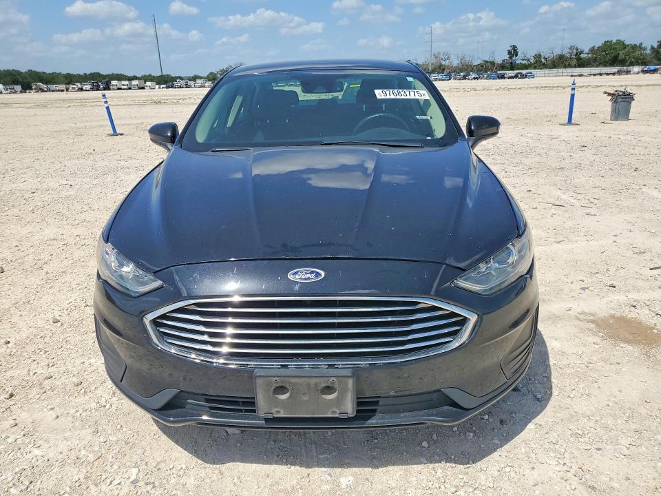 2019 Ford Fusion VIN 3FA6P0HD5KR148585 COPART salvage auction — MINOR DENT/SCRATCHES, Tx - Certificate Of Title, sold $1,300 on 2026-07-09 (photo 5)